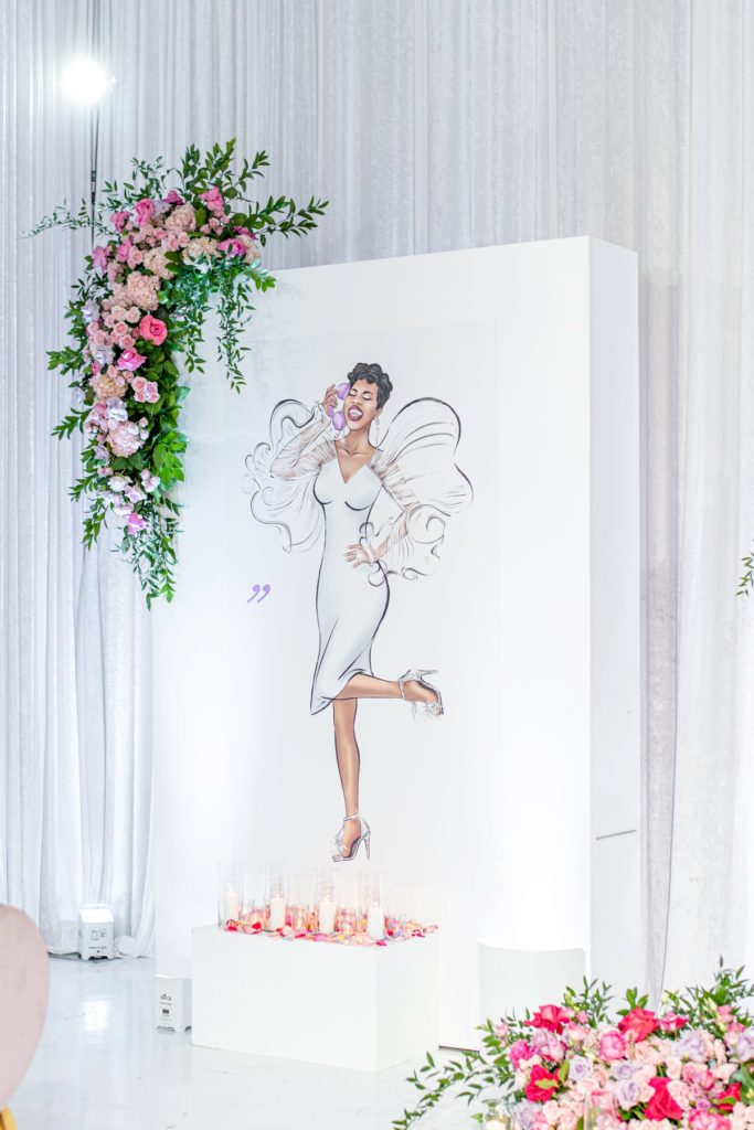 Life-size sketch block of the bride to be used as a statement piece for bridal shower decor. a