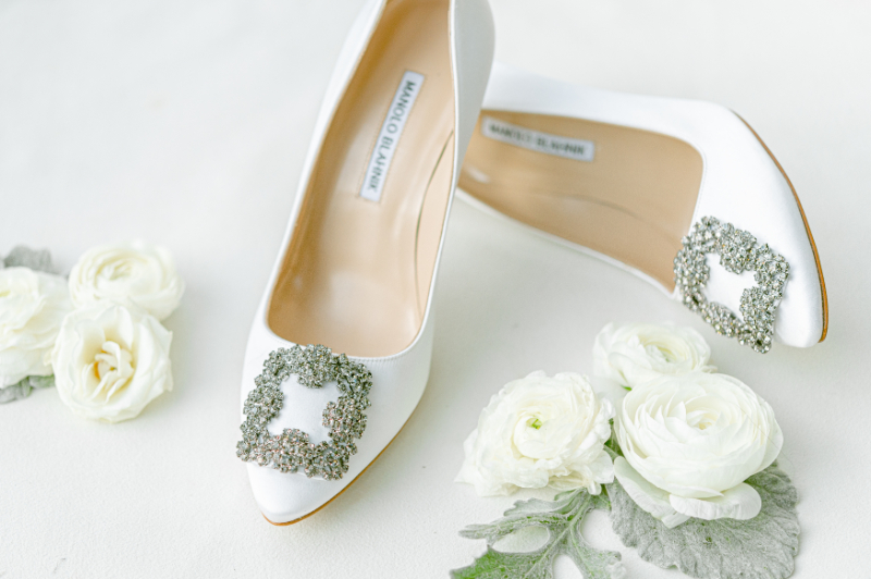 white bridal shoes with jewel accents Manolo Blahnik