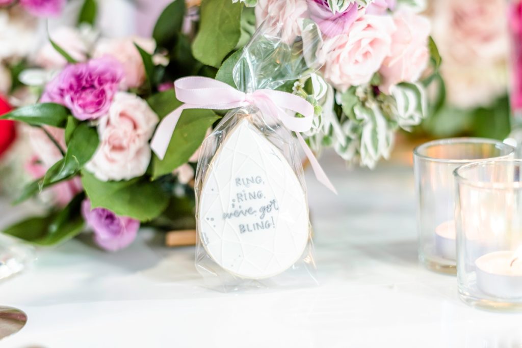 White sugar cookie favor for a bridal shower.