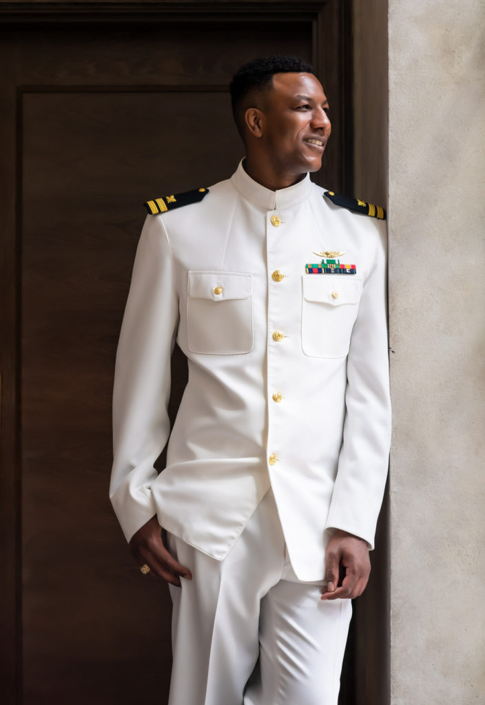 Groom in white navy military uniform