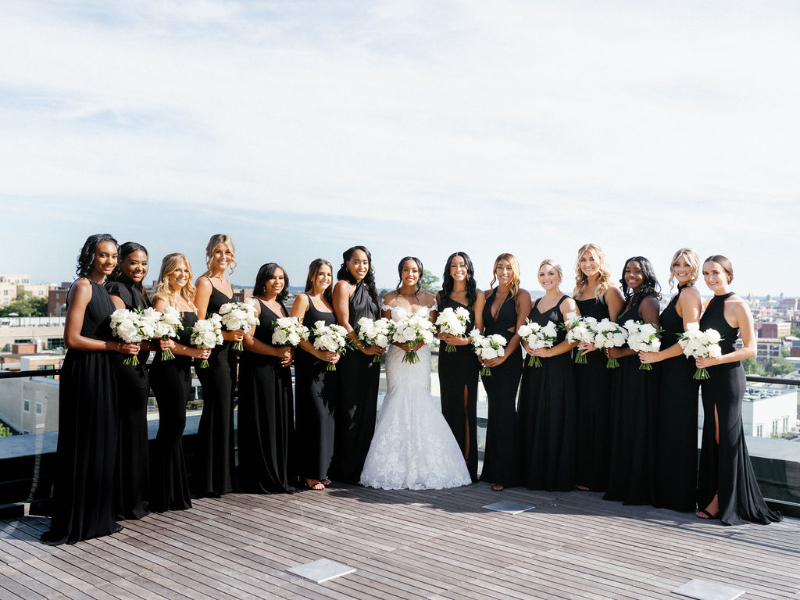 black bridesmaid dresses and bride in white wedding dress - rooftop wedding photos in DC