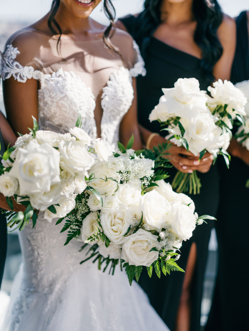 closeup of brides white and greenery bouquet