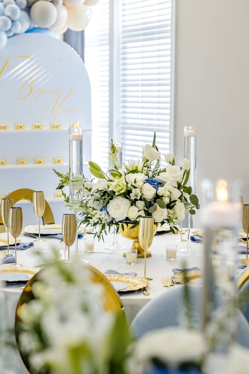 gold and blue reception tables at luxury baby shower