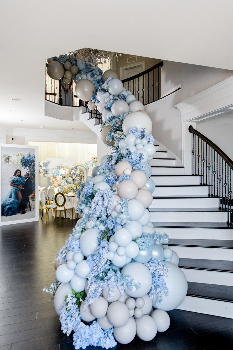 cascading balloon staircase decor for baby shower