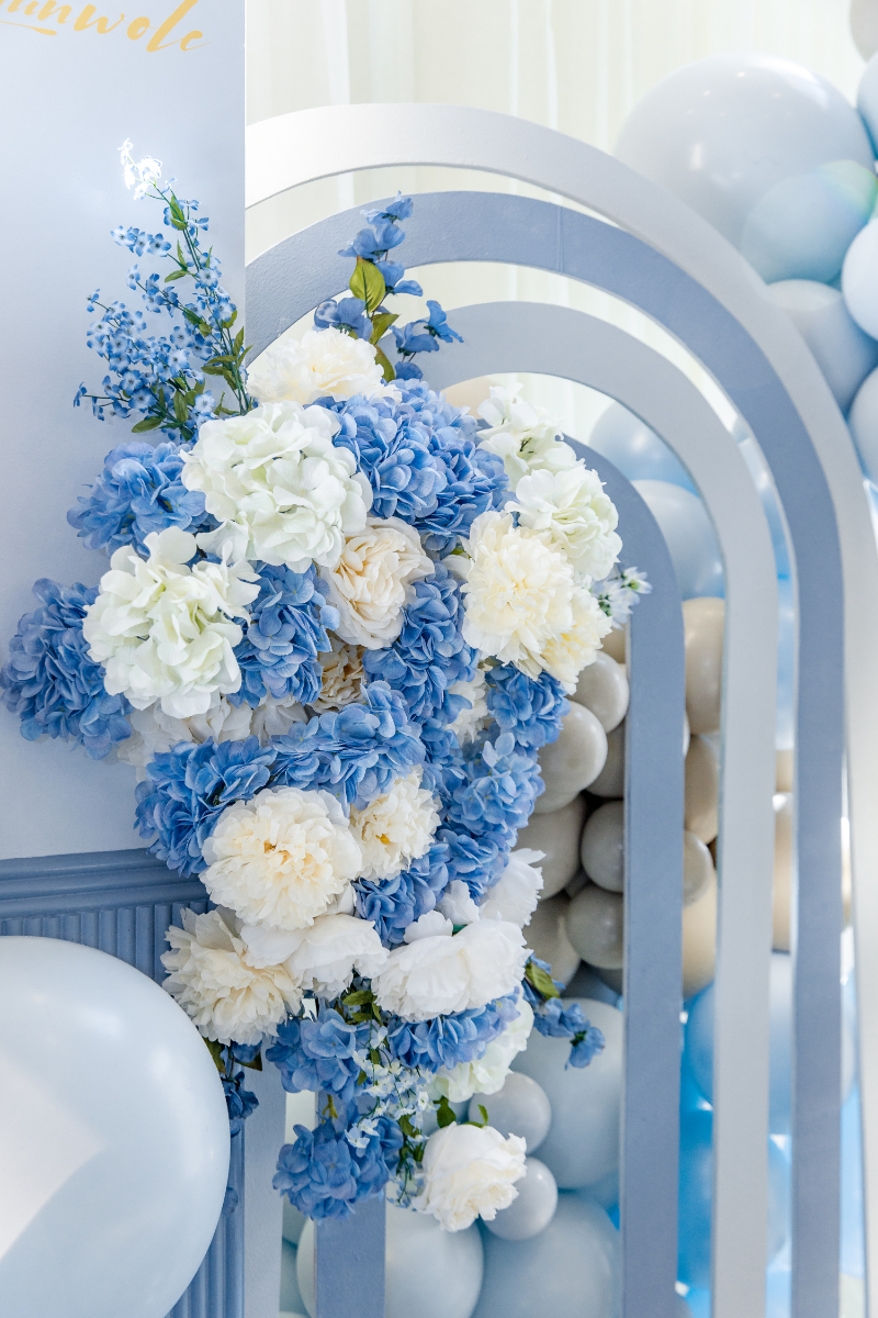 blue and white flower decor for baby shower