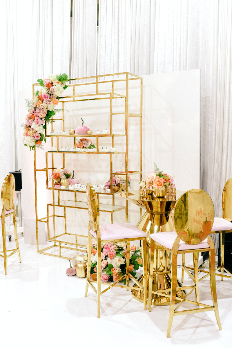 gold and pink baby shower decor ideas with pumpkin favors
