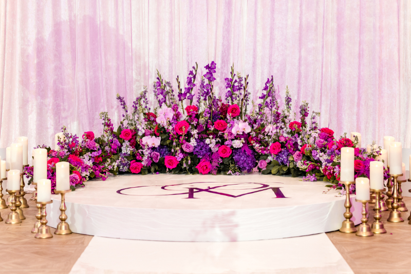 pink and purple florals for luxury wedding ceremony at the Schuyler