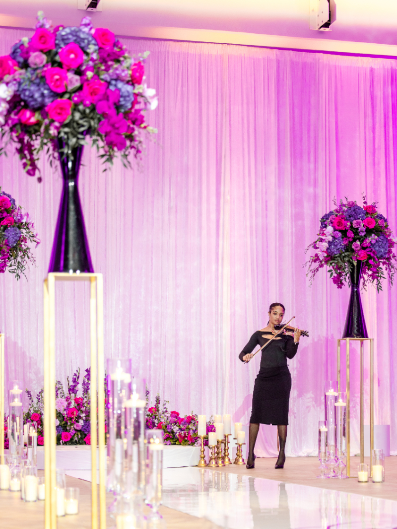 violin playing for colorful wedding ceremony