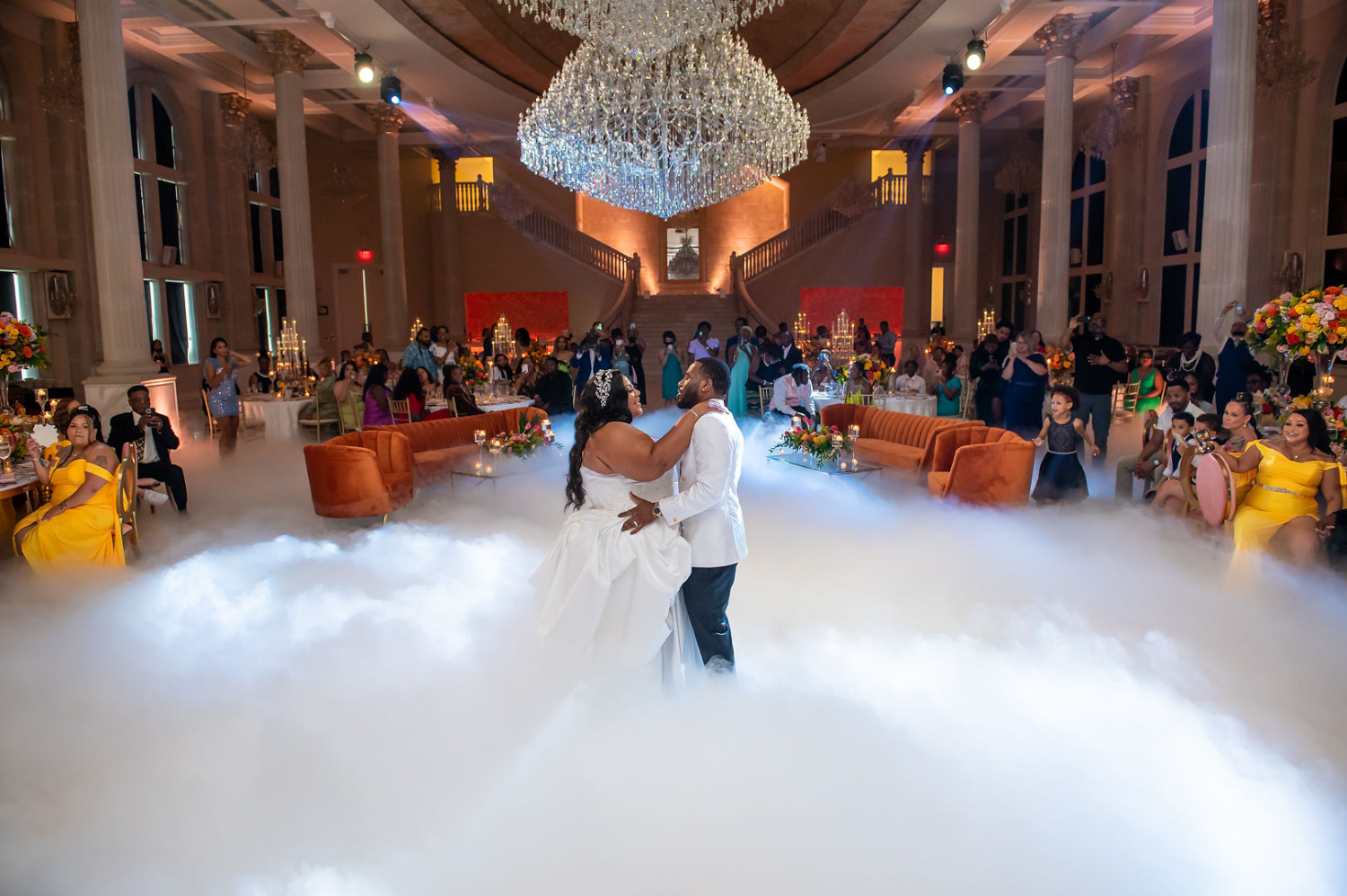 bride and groom first dance with smoke bomb