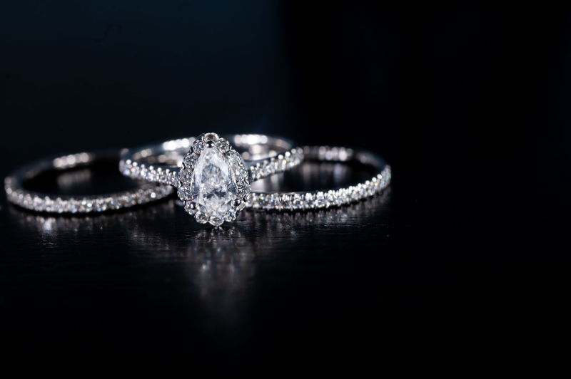 diamond wedding rings on black background