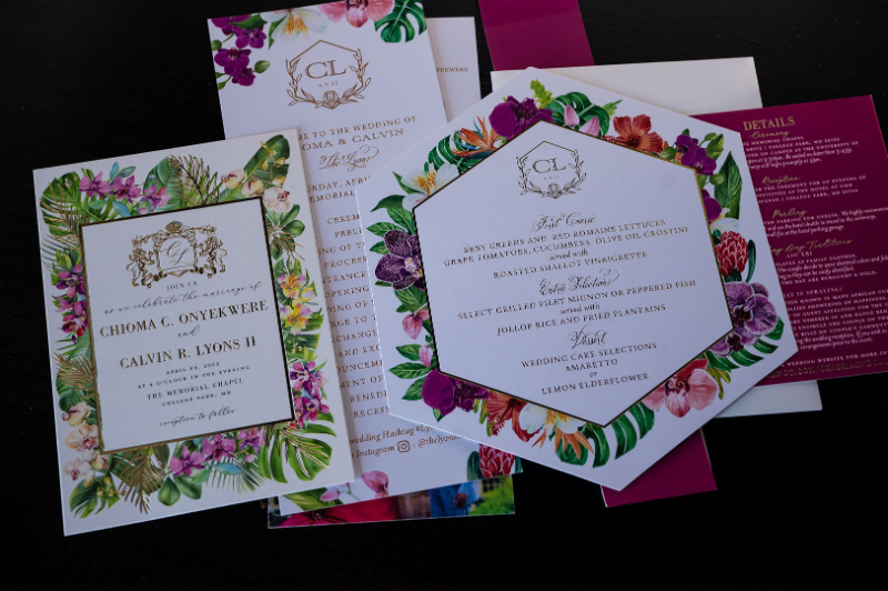 tropical colorful wedding invitation flatlay