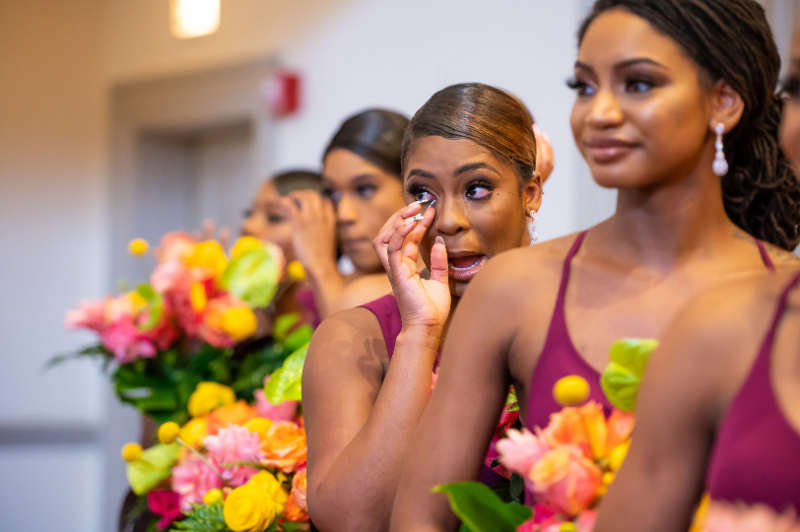 bridesmaids cry during ceremony