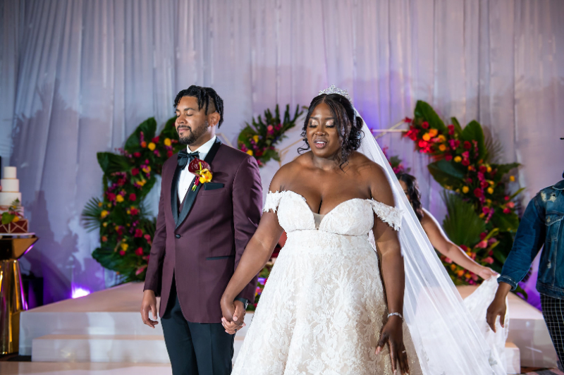 bride and groom close eyes before wedding reception