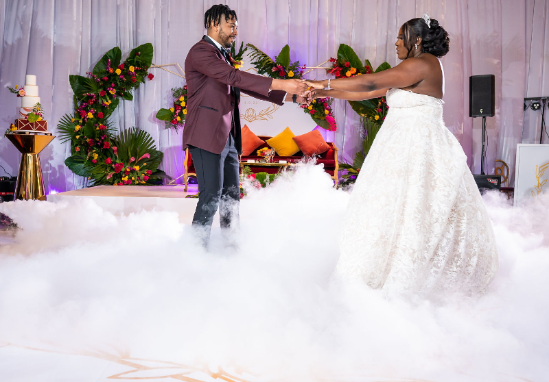 bride and groom first dance with smoke bomb