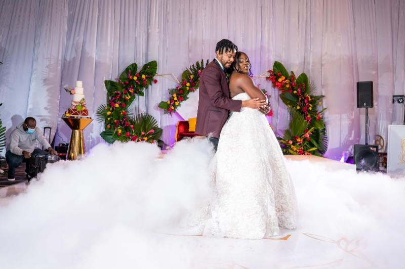bride and groom dance with smoke bomb