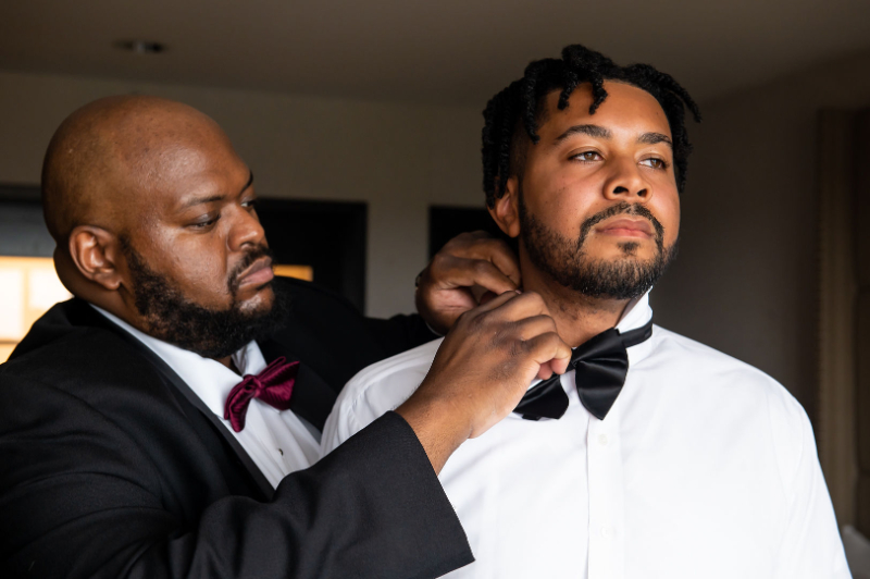 groom getting ready with best man at the Hotel at the University of Maryland