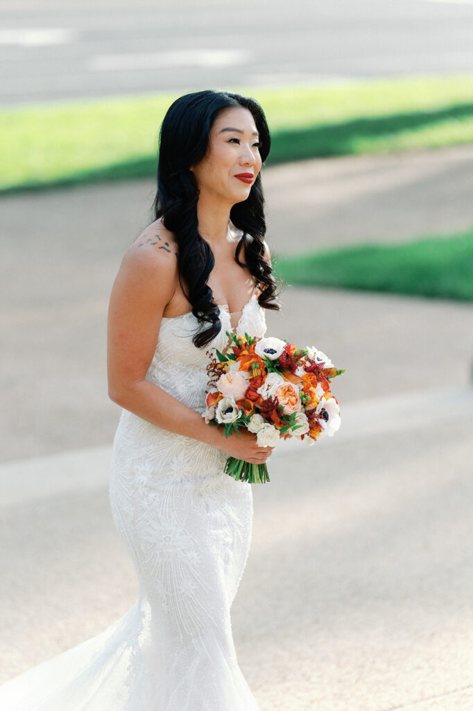 Bride walks across DC streets to enter her wedding ceremony. 