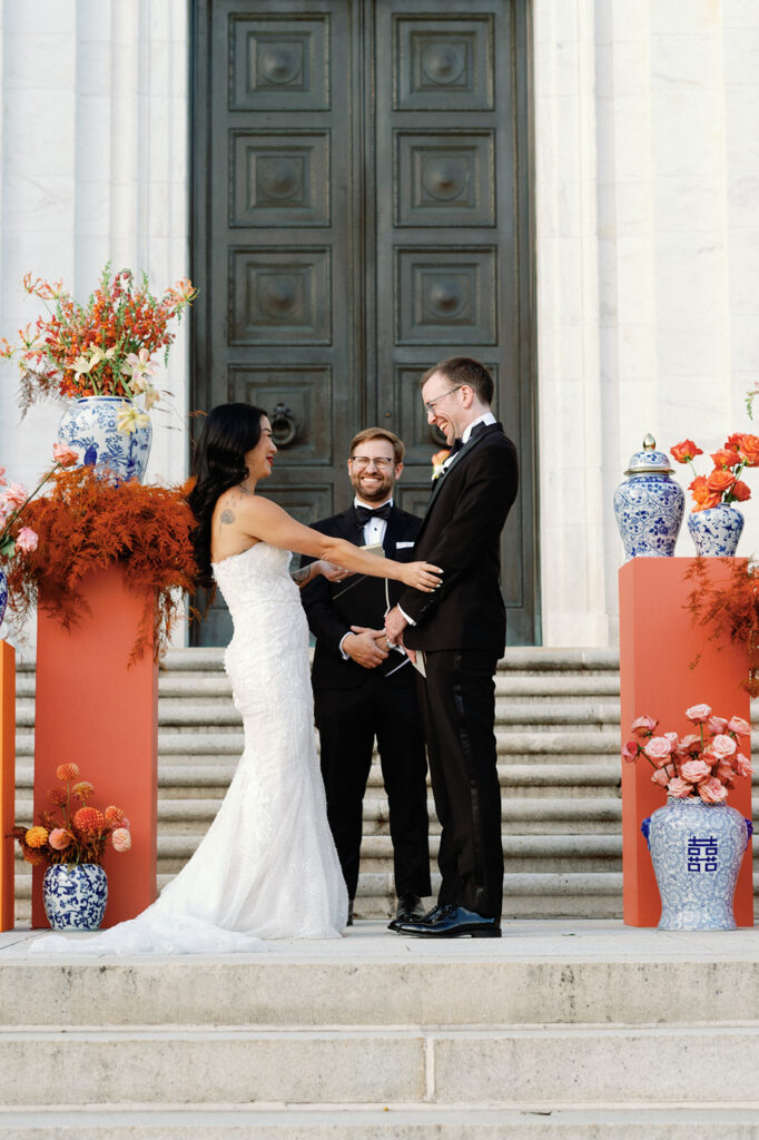 Bride and groom exchange vows during outdoor fall wedding ceremony at Potomac View Terrace. 