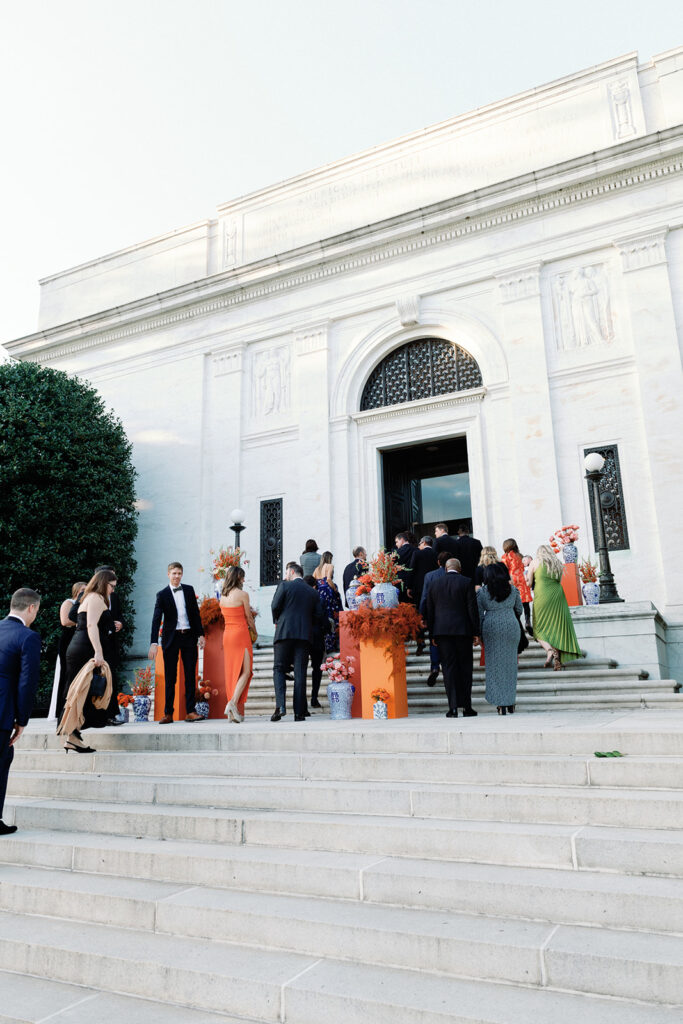 Guests walk up steps of Potomac View Terrace to enter cocktail hour.