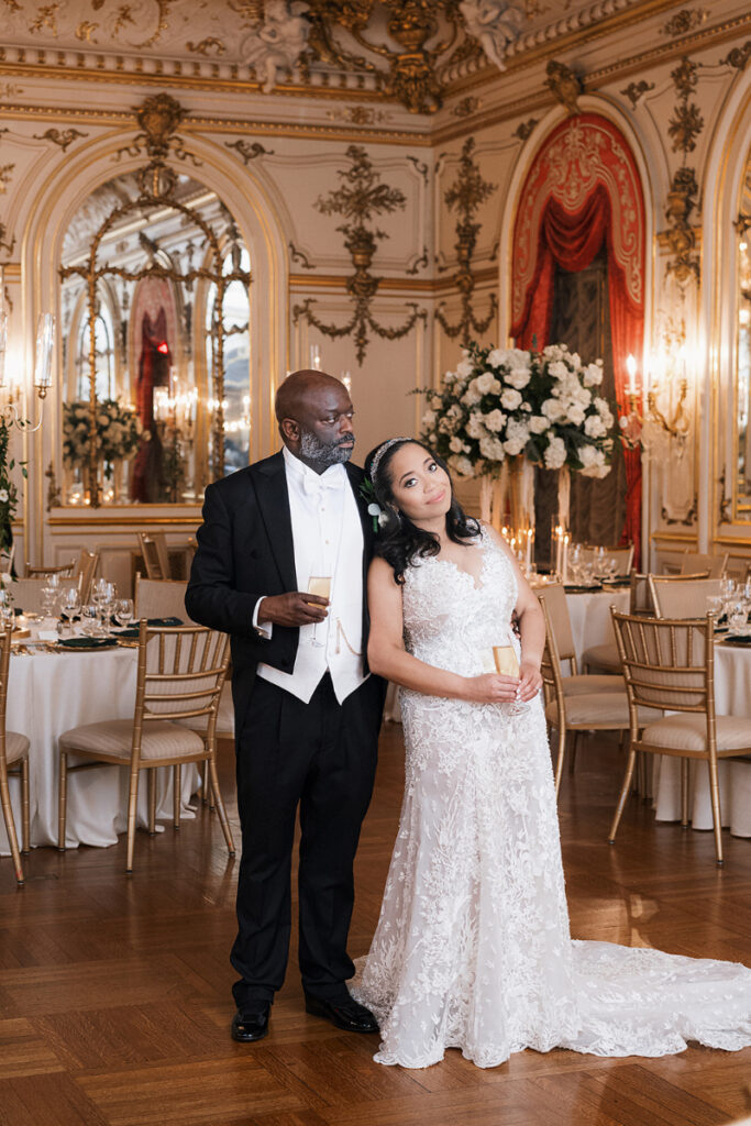 Bride and groom take in the views after their reception room reveal.
