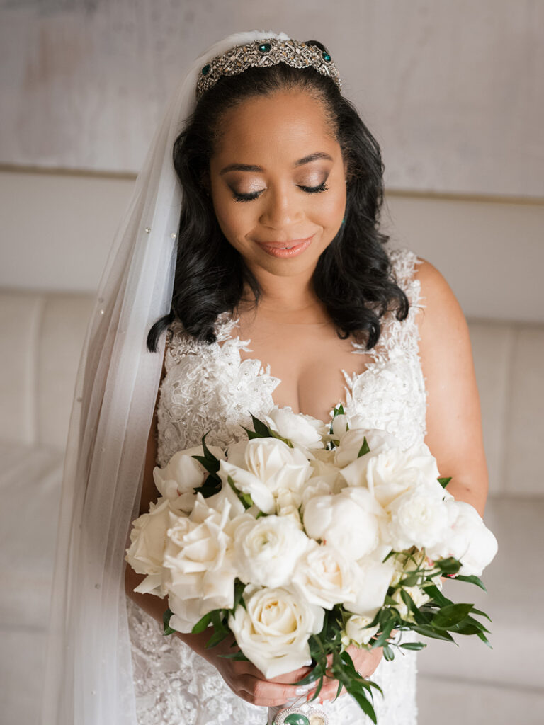 Bride poses for portrait.