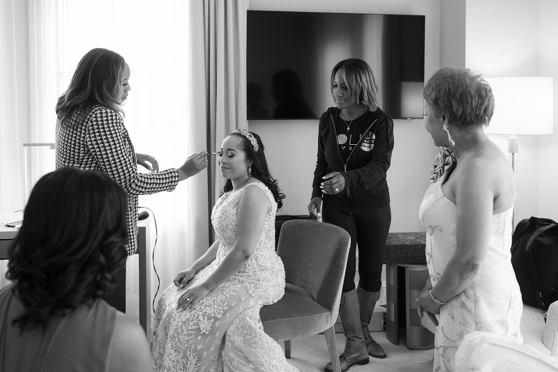 Glam squad gets bride ready for her Cosmos Club wedding.