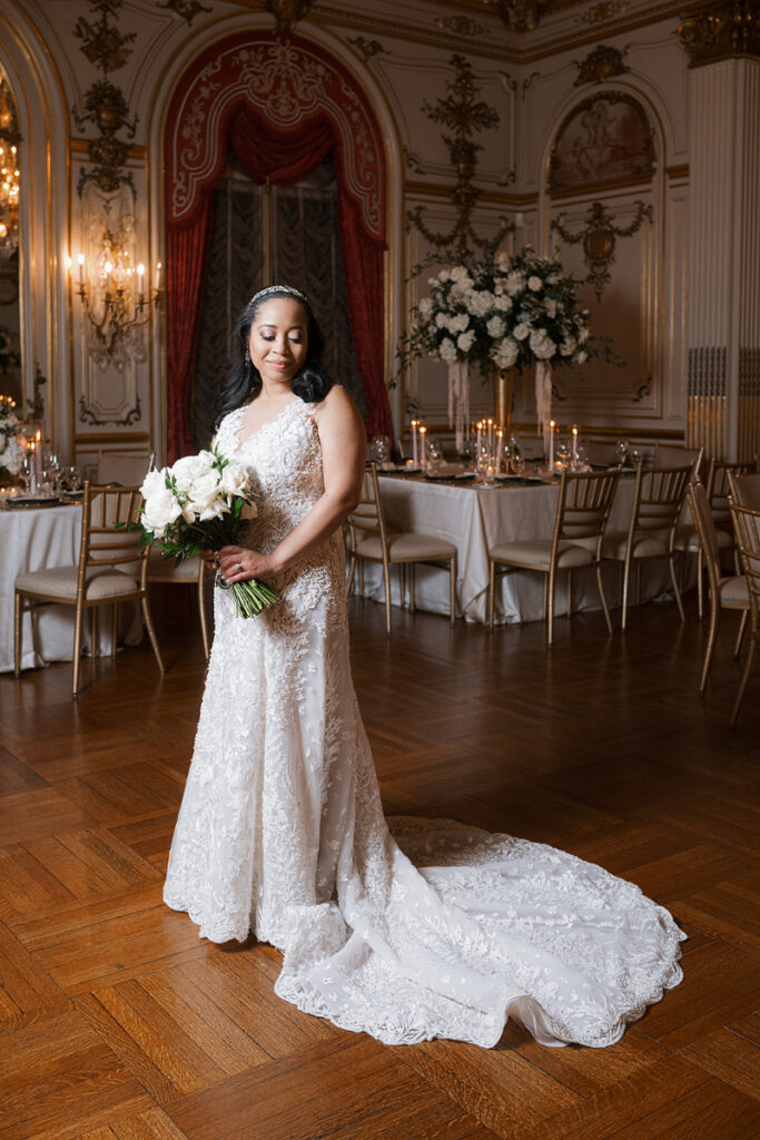 Bride poses for portrait in Cosmos Club.