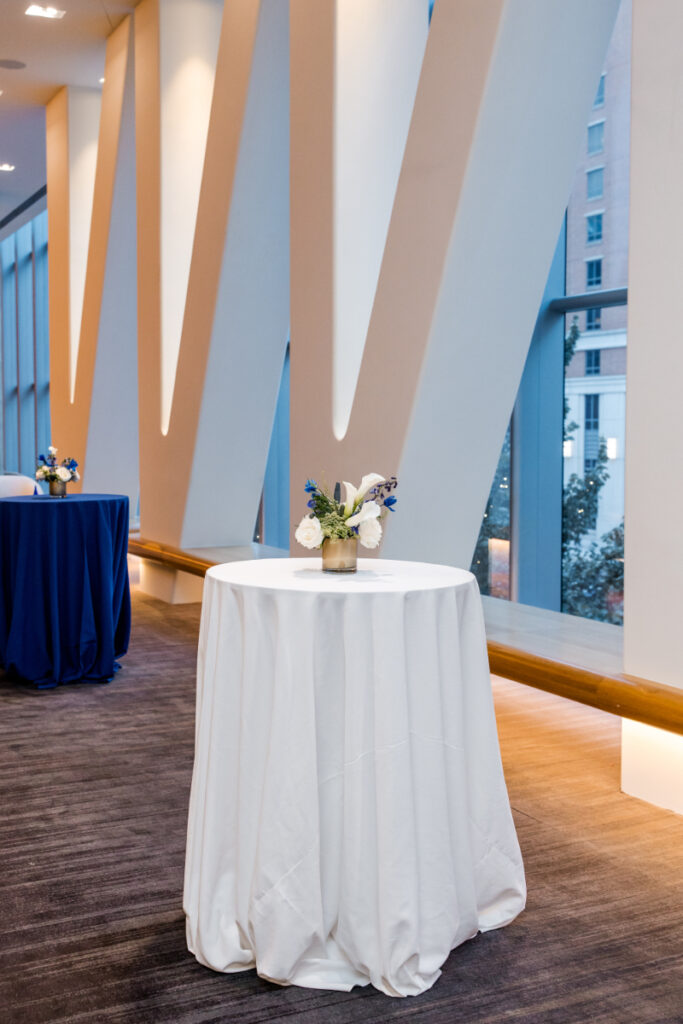 Corporate event planning in Washington DC put together cocktail tables with small floral arrangements for AAREP gala.
