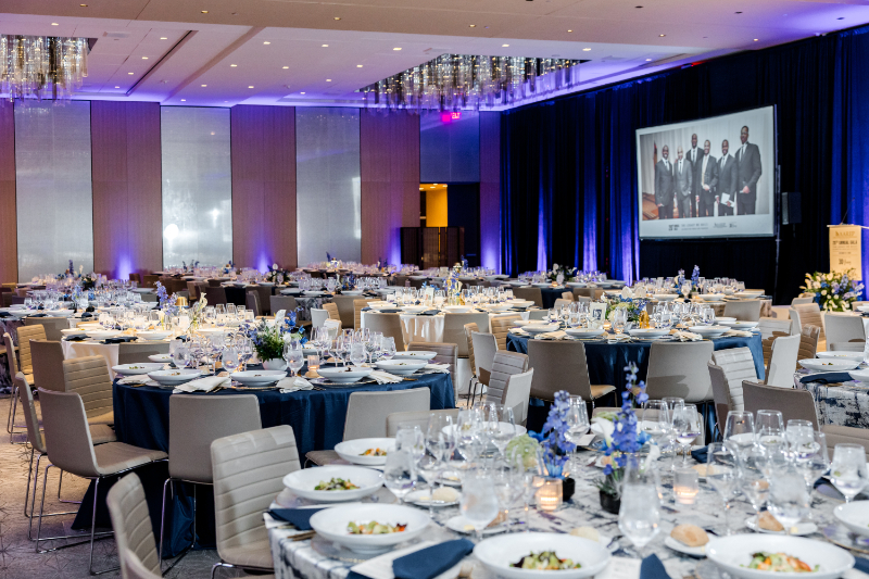 Table setting for AAREP gala executed by corporate event planning team, Jayne Heir Events.